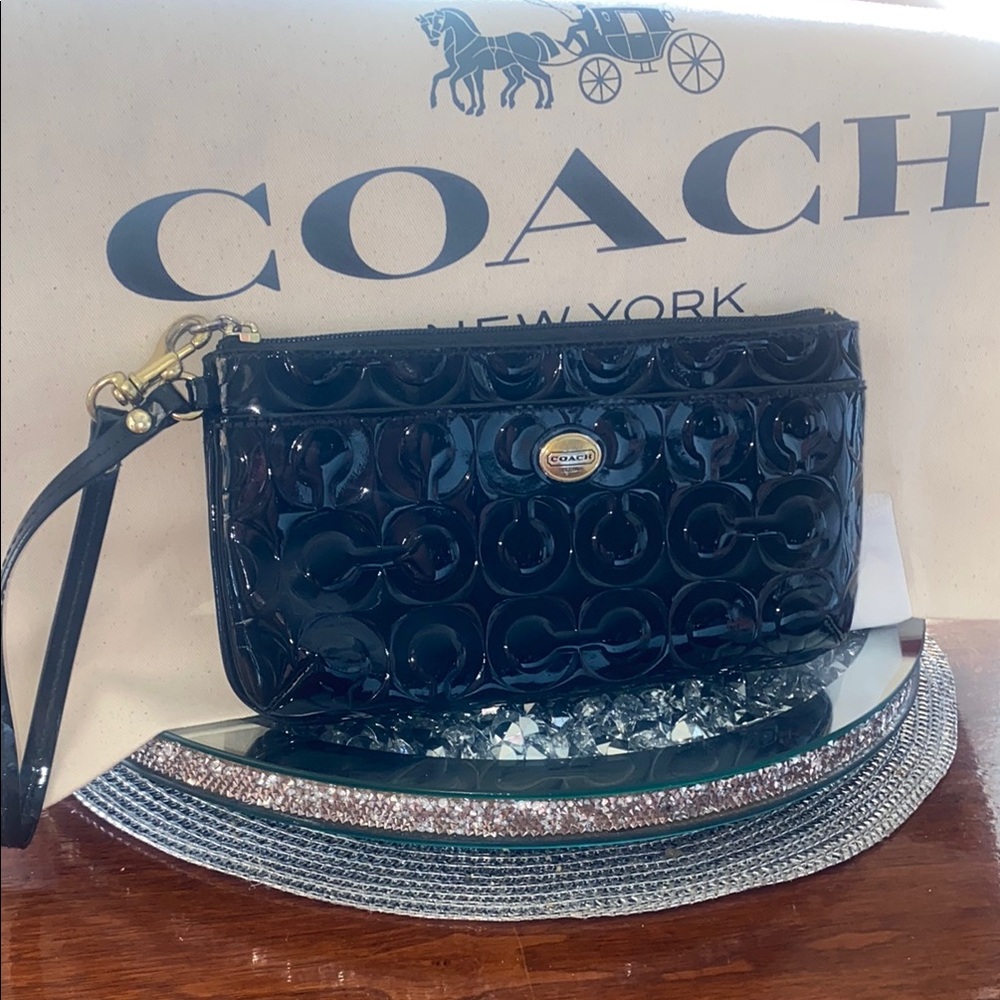 Rare 💯Coach Black clutch  with Signature Monogram 9 inches by 5.5 large